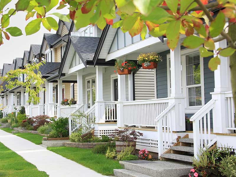 Row of homes managed by property managers for an HOA